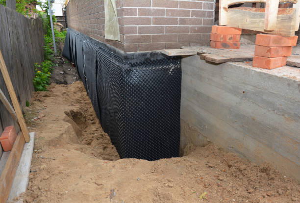 Happy homeowners after waterproofing job in Whitwell